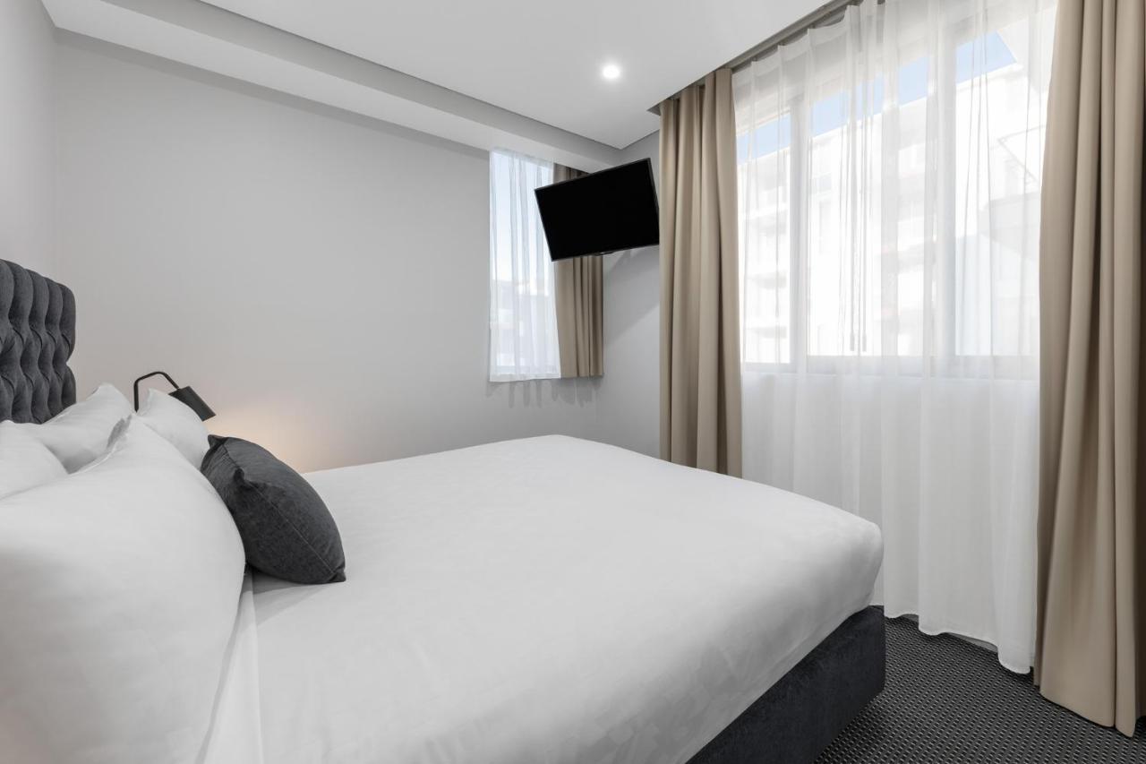Meriton Suites North Ryde Σίδνεϊ Εξωτερικό φωτογραφία A bedroom at the hotel