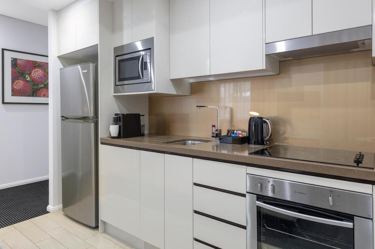 Meriton Suites North Ryde Σίδνεϊ Εξωτερικό φωτογραφία A typical kitchen in a serviced apartment